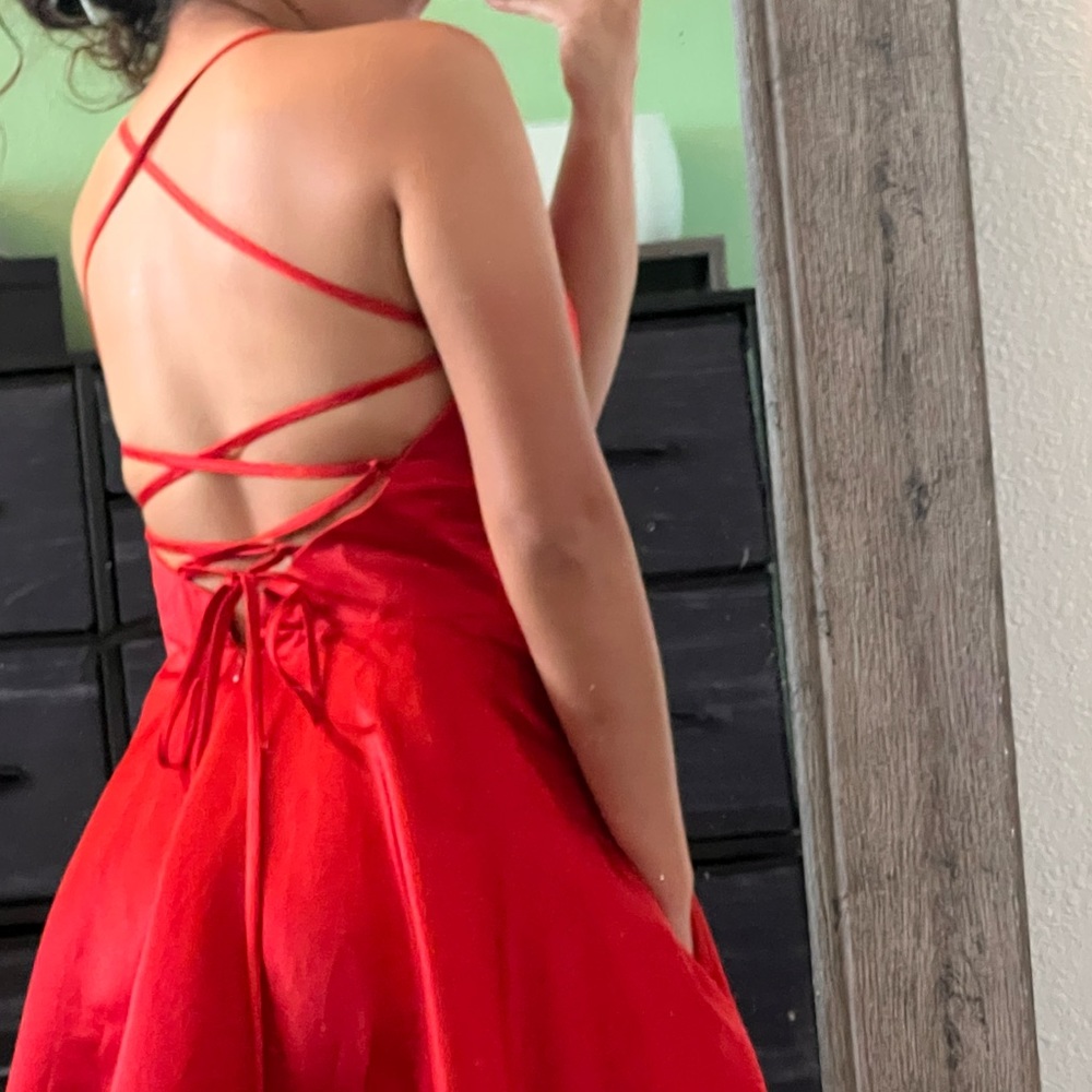 Red, Backless Homecoming dress. Size 6. HAS POCKETS!!